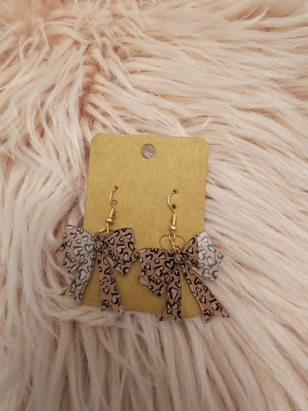 Bow 🎀 Dangles With Leopard Print Hearts