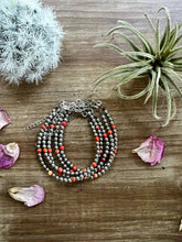 Load image into Gallery viewer, Fashion Pearl Bracelet With a bit of Orange
